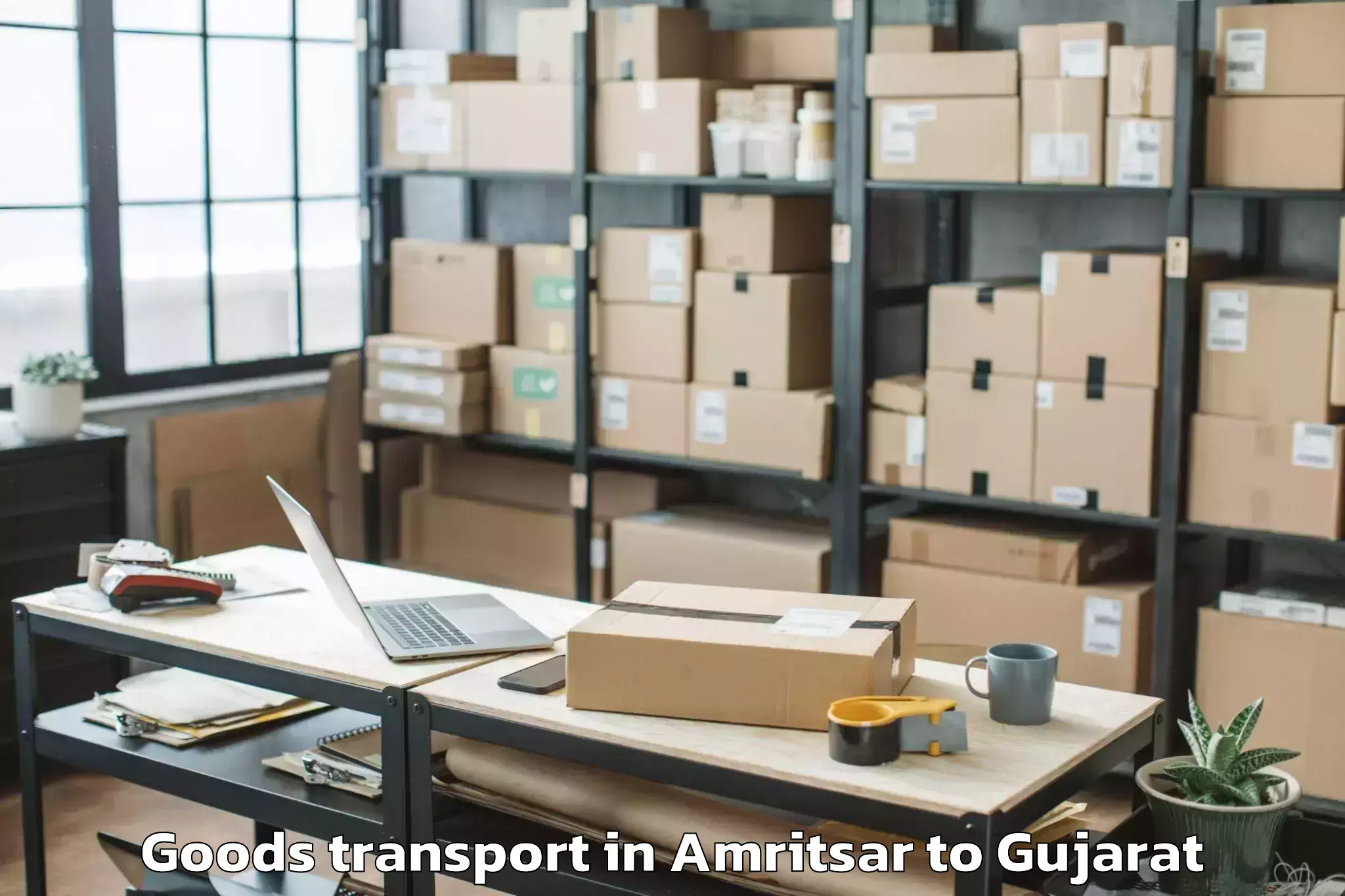 Trusted Amritsar to Hansot Goods Transport